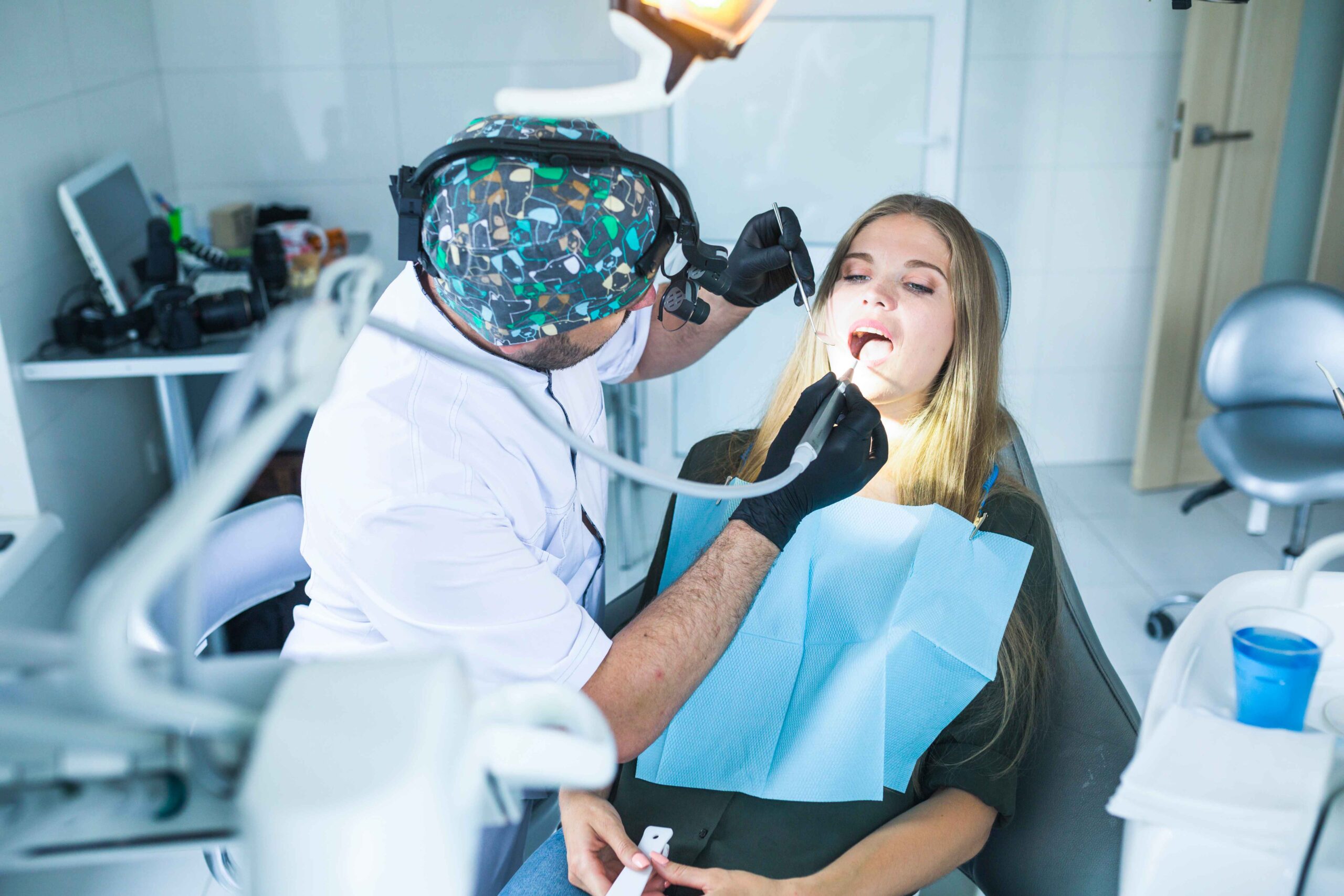 dentist curing her teeth